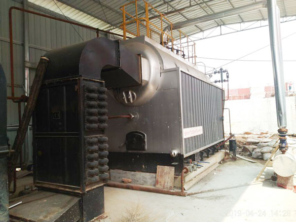 01.11-6-ton-DZH-steam-wood-log-fired-boiler-running-well-Uruguay1.jpg